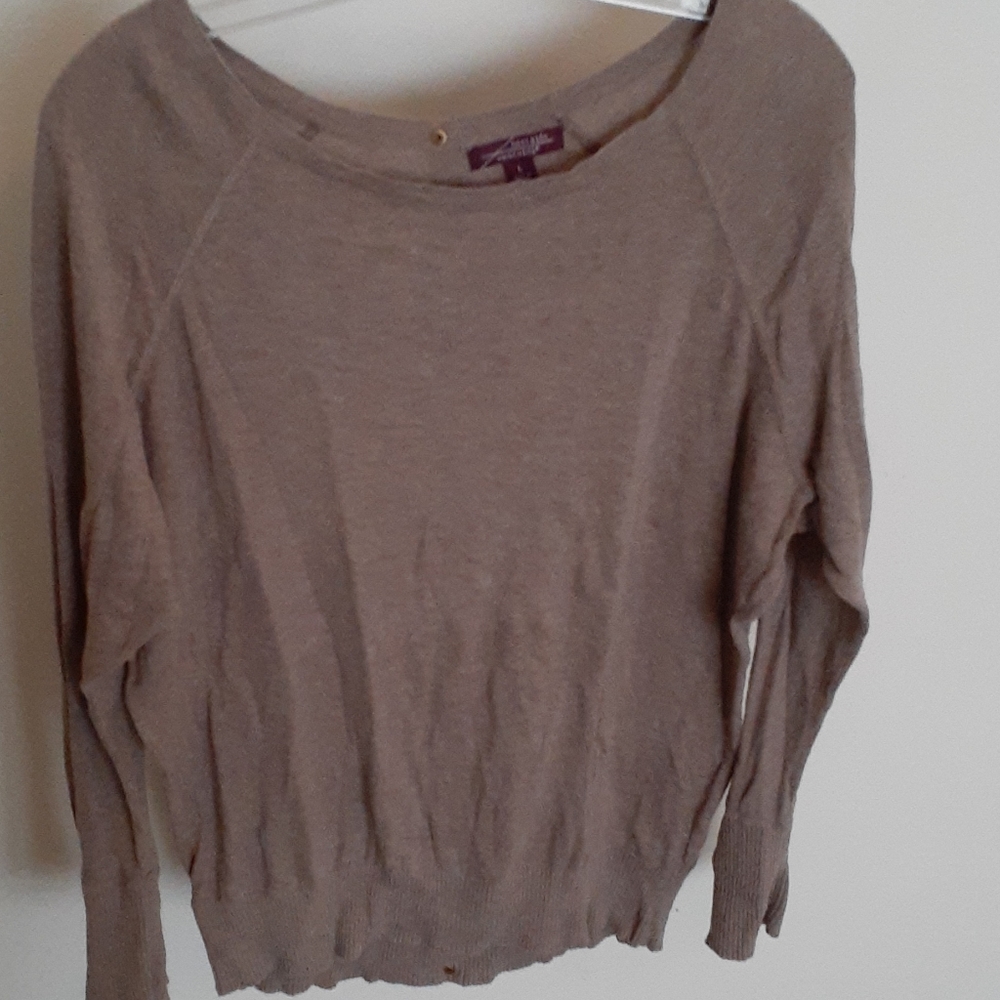 Tan sweater with buttons down back